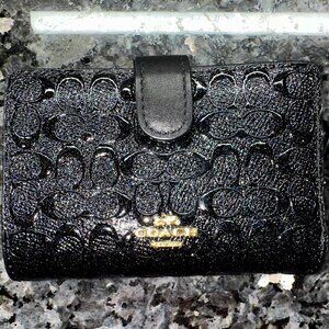 HOLOGRAPHIC COACH MEDIUM CORNER ZIP WALLET IN SIGNATURE EMBOSSED BLACK LEATHER